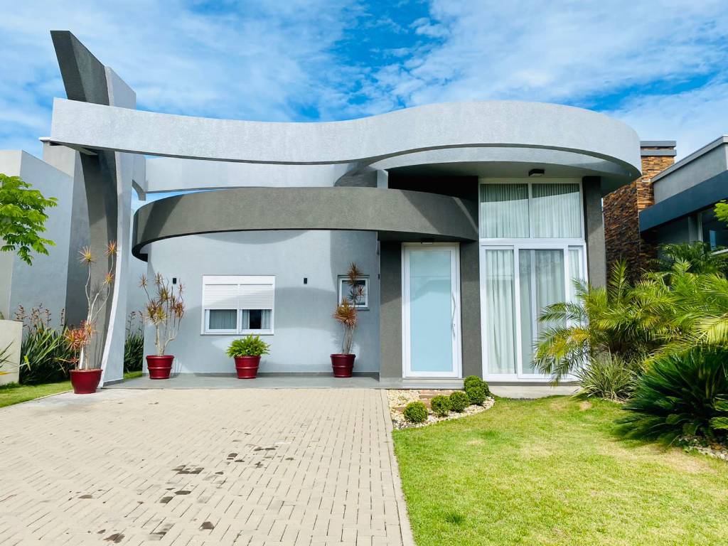 Casa em condomínio 4 dormitórios à venda no bairro Araçá em Capão Da Canoa - imovel 6737